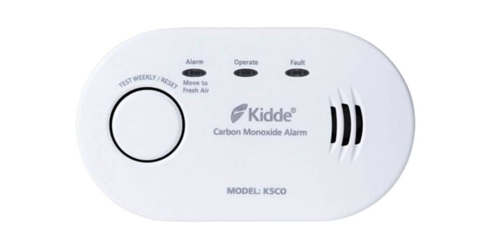 Kidde E-20 carbon monoxide alarm, a compact device designed for detecting harmful CO levels in residential spaces.