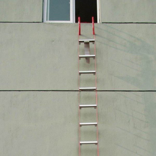 Fire Escape Ladder - 4.5m in use against building
